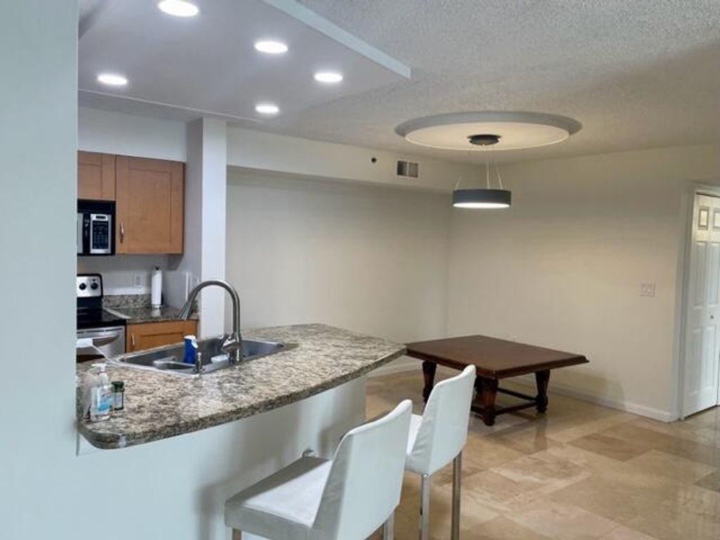 Photo of 3151 Clint Moore Road #104, Boca Raton, FL 33496 (MLS # R10954870)