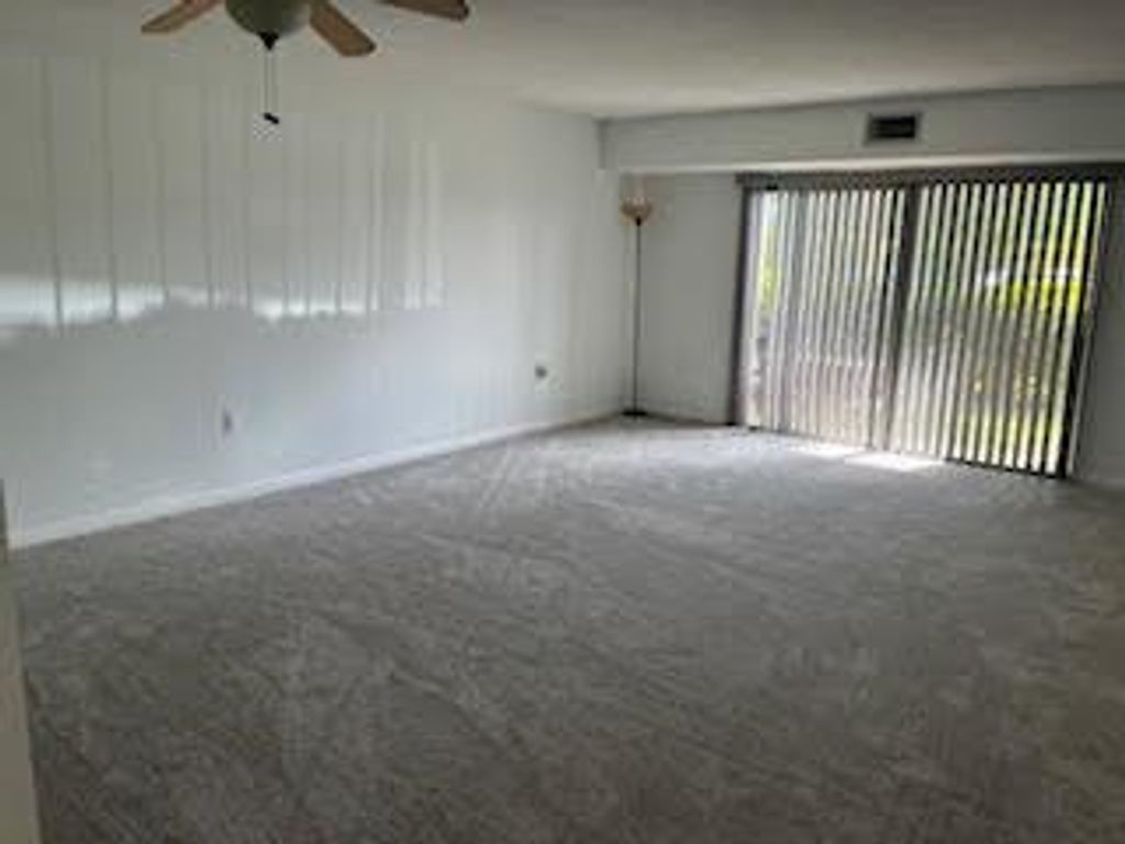 Photo of 4657 Fountains Drive S #104, Lake Worth, FL 33467 (MLS # R11125964)