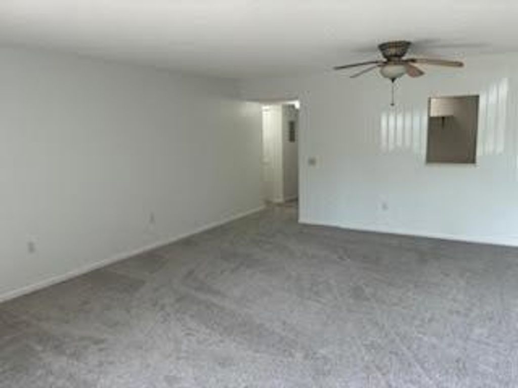Photo of 4657 Fountains Drive S #104, Lake Worth, FL 33467 (MLS # R11125964)