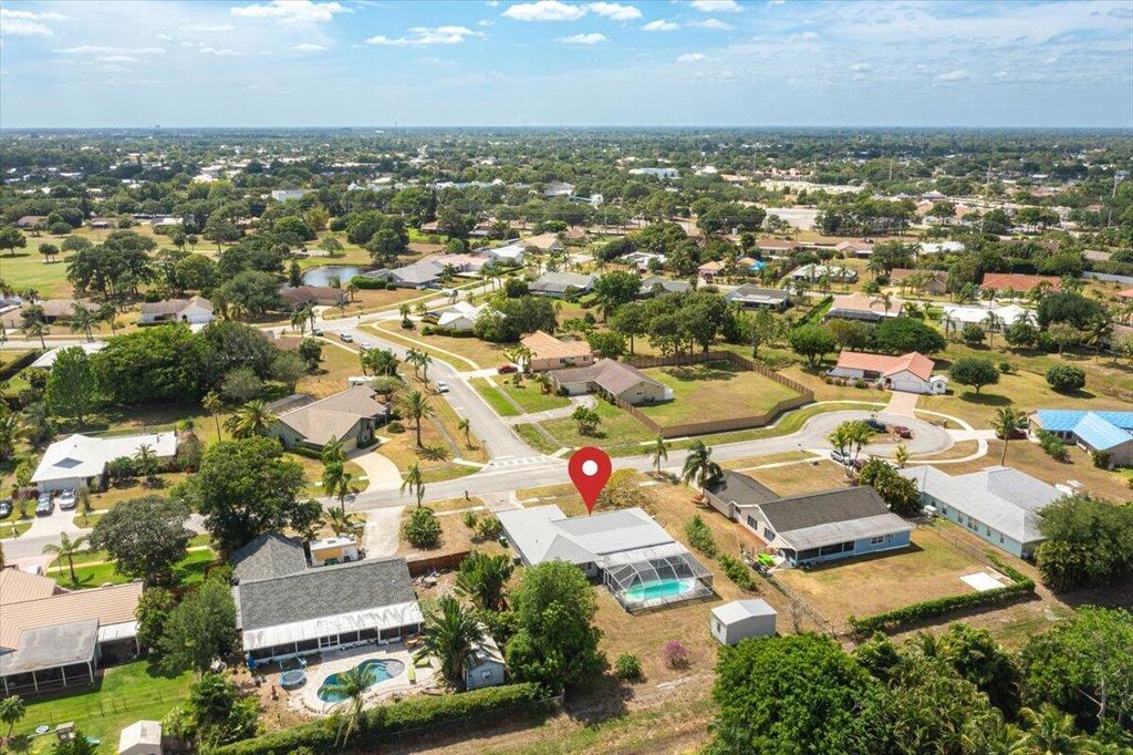Photo of 2437 SE Drayton Road, Port Saint Lucie, FL 34952 (MLS # R10981994)