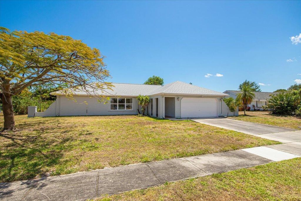 Photo of 2437 SE Drayton Road, Port Saint Lucie, FL 34952 (MLS # R10981994)