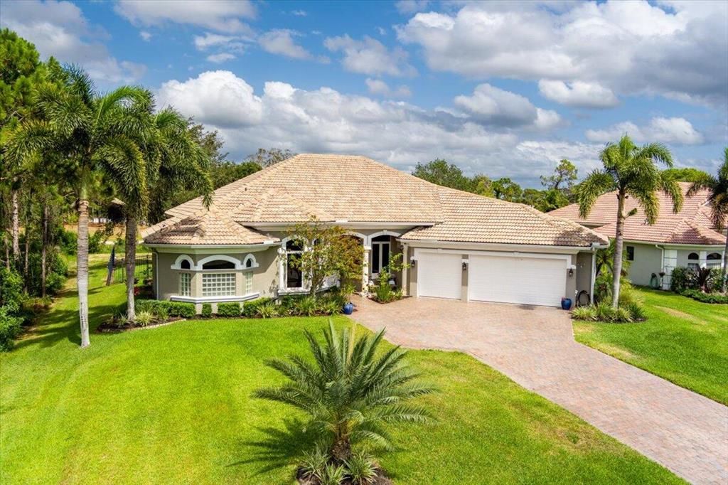 Photo of 931 SW Squire Johns Lane Ln, Palm City, FL 34990 (MLS # R10798682)