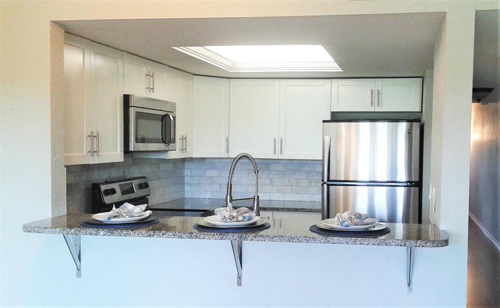 BEST VALUE IN BOCA RATON Spacious 1340 sq ft updated 2 story townhouse in great West Boca location. End unit with extra windows and light with large 3rd floor patio off Master. Golf Course view. Updated kitchen with, granite countertops ,marble backsplash, stainless steel appliances, laminate flooring on first floor and guest bedroom, carpet in master. Washer/dryer in unit. First floor powder room. All bathrooms updated. Close to shopping and Boca's best A rated school districts. Clubhouse with pool and recently renovated tennis courts. ALL AGES !! HOA has reserves so no minimum down payment. No lease first year.