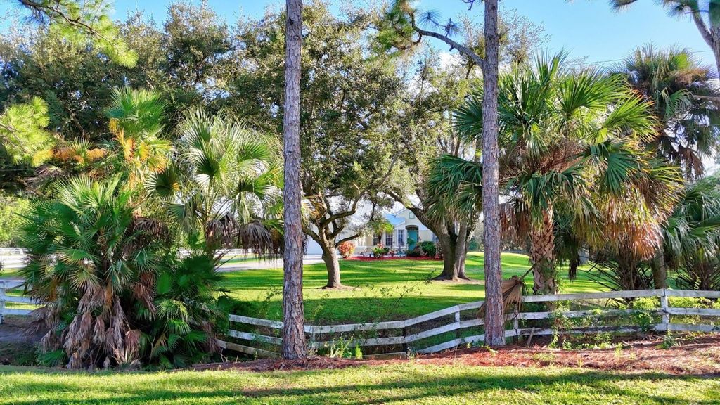 Photo of 5602 SW Sunshine Farms Way, Palm City, FL 34990 (MLS # F10531102)