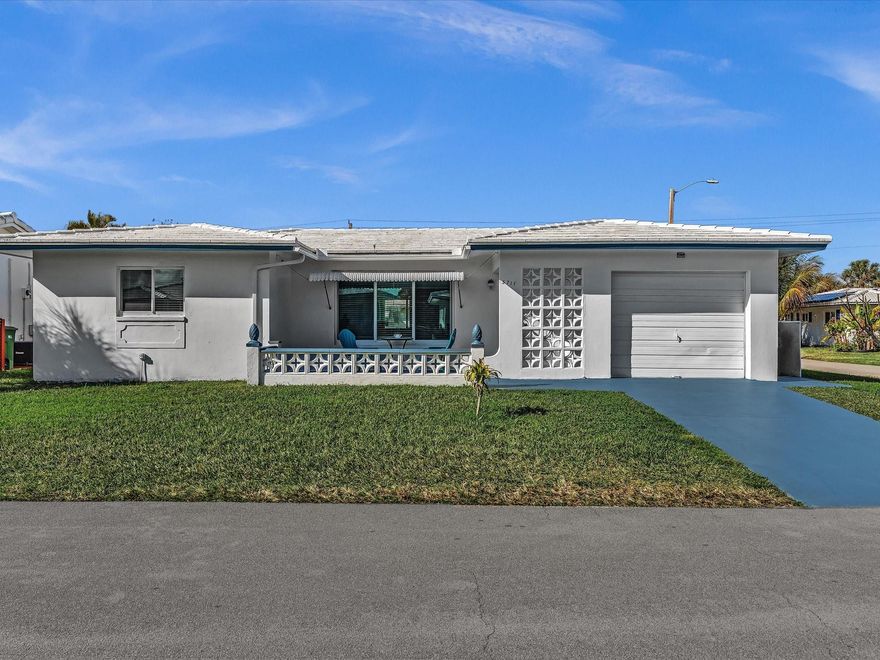 Welcome to this spacious and well-maintained single-family home located in the sought-after Mainlands of Tamarac Lakes community. This classic 1970 residence features 2 bedrooms and 2 full bathrooms with approximately 1,660 sq ft of living space and sits on a generous 5,568 sq ft corner lot — a rare find in this neighborhood. Inside, enjoy a light-filled layout with ample room for both everyday living and entertaining. The home offers a roomy living area and separate dining space that flow seamlessly, ideal for today’s lifestyle. Mature landscaping frames the property, enhancing curb appeal and providing a peaceful setting.one of Tamarac’s established neighborhoods.