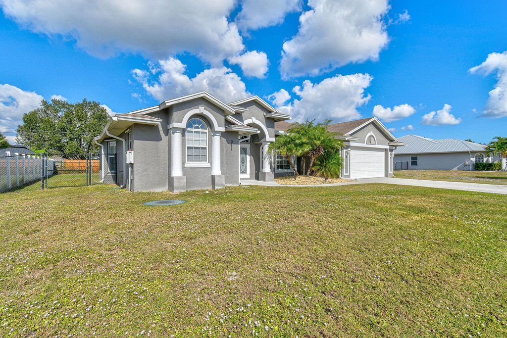 Photo of 971 SW Mccomb Avenue, Port Saint Lucie, FL 34953 (MLS # R11144866)