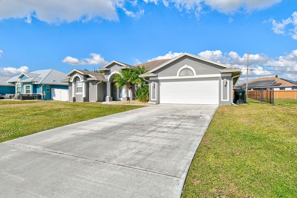 Photo of 971 SW Mccomb Avenue, Port Saint Lucie, FL 34953 (MLS # R11144866)