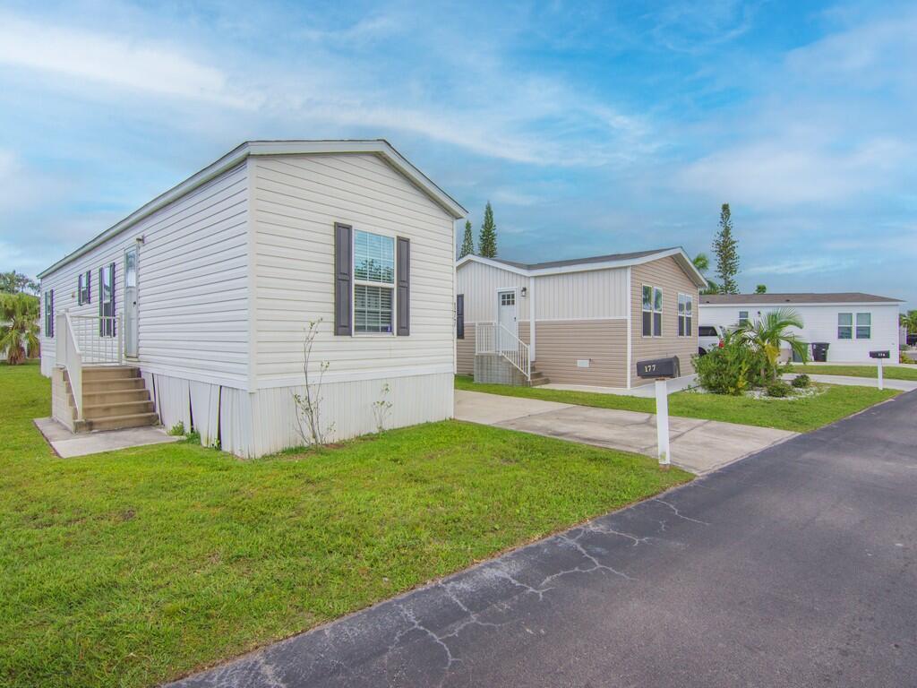 2-bedroom 2-bathroom manufactured home for sale located in a vibrant 55+gated community. This home is built in 2016 with a bright and open floor plan. Covered carport and huge storage shed. Close to shopping dining and local attractions. Land lease community