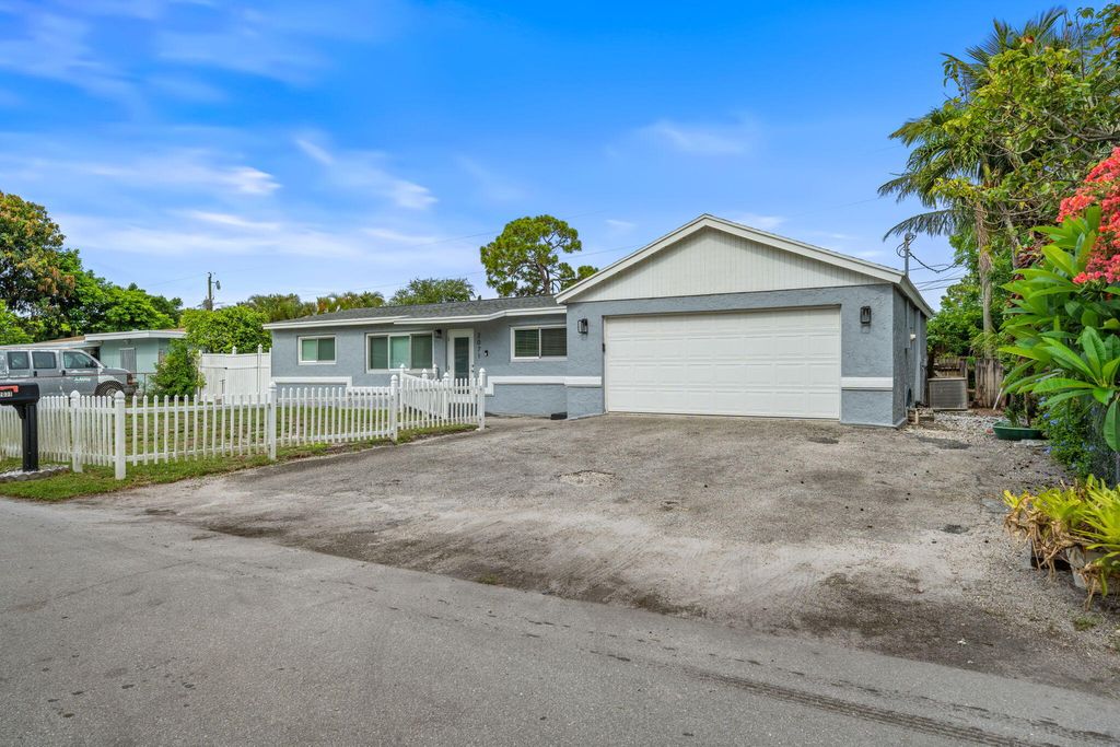 Photo of 2071 W Carrol Circle, West Palm Beach, FL 33415 (MLS # R11098865)