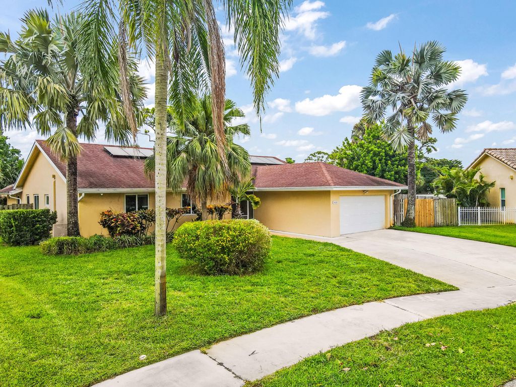 Photo of 4100 NW 7th Lane, Delray Beach, FL 33445 (MLS # R11016273)