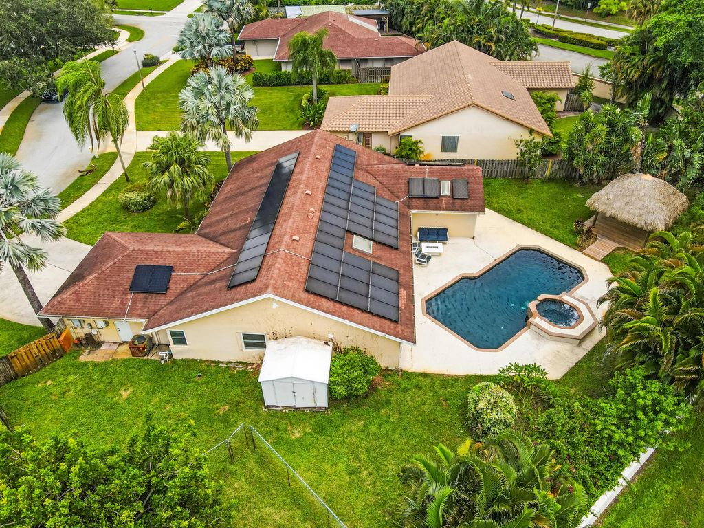 Photo of 4100 NW 7th Lane, Delray Beach, FL 33445 (MLS # R11016273)