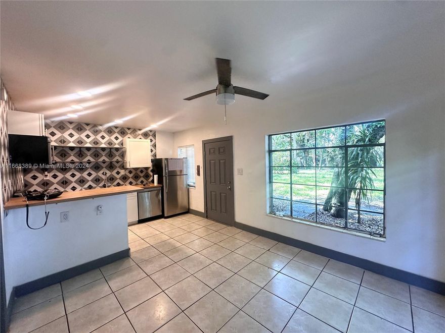 Bright corner unit in a great location with easy access to all major highways. This inviting home features a fully equipped kitchen with all appliances included, a spacious walk-in closet, and window A/C. Rent includes water, sewer, trash, and complimentary laundry facilities in the complex. The standout feature is the private backyard, offering a rare outdoor space to relax and enjoy. Move-in costs include first month's rent, two security deposits, and a $250 pet fee. Conveniently located near shopping, dining, and transportation.