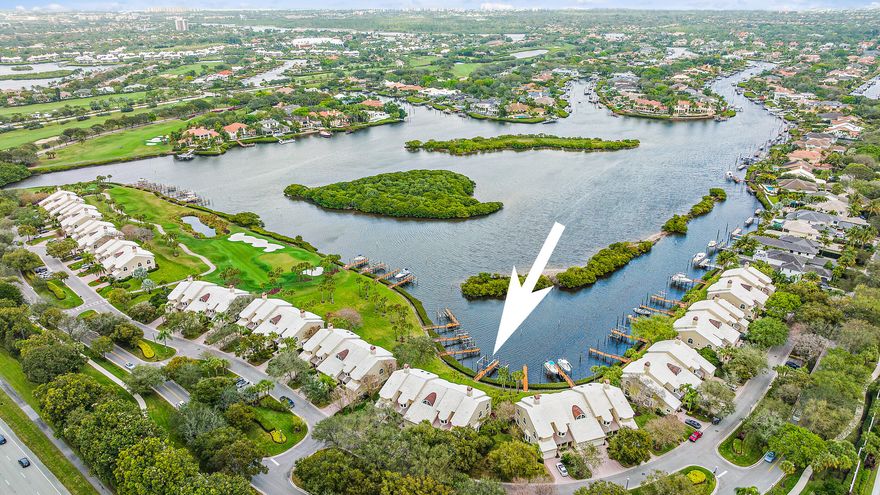Gorgeous sunny renovated condo in the sought after Admirals Cove community with stunning water views. This first floor corner unit  features floor to ceiling impact sliders showcasing a stunning wide water view. Den has been redone to be used as a 3rd bedroom. Great opportunity to be a part of Admirals Cove lifestyle!