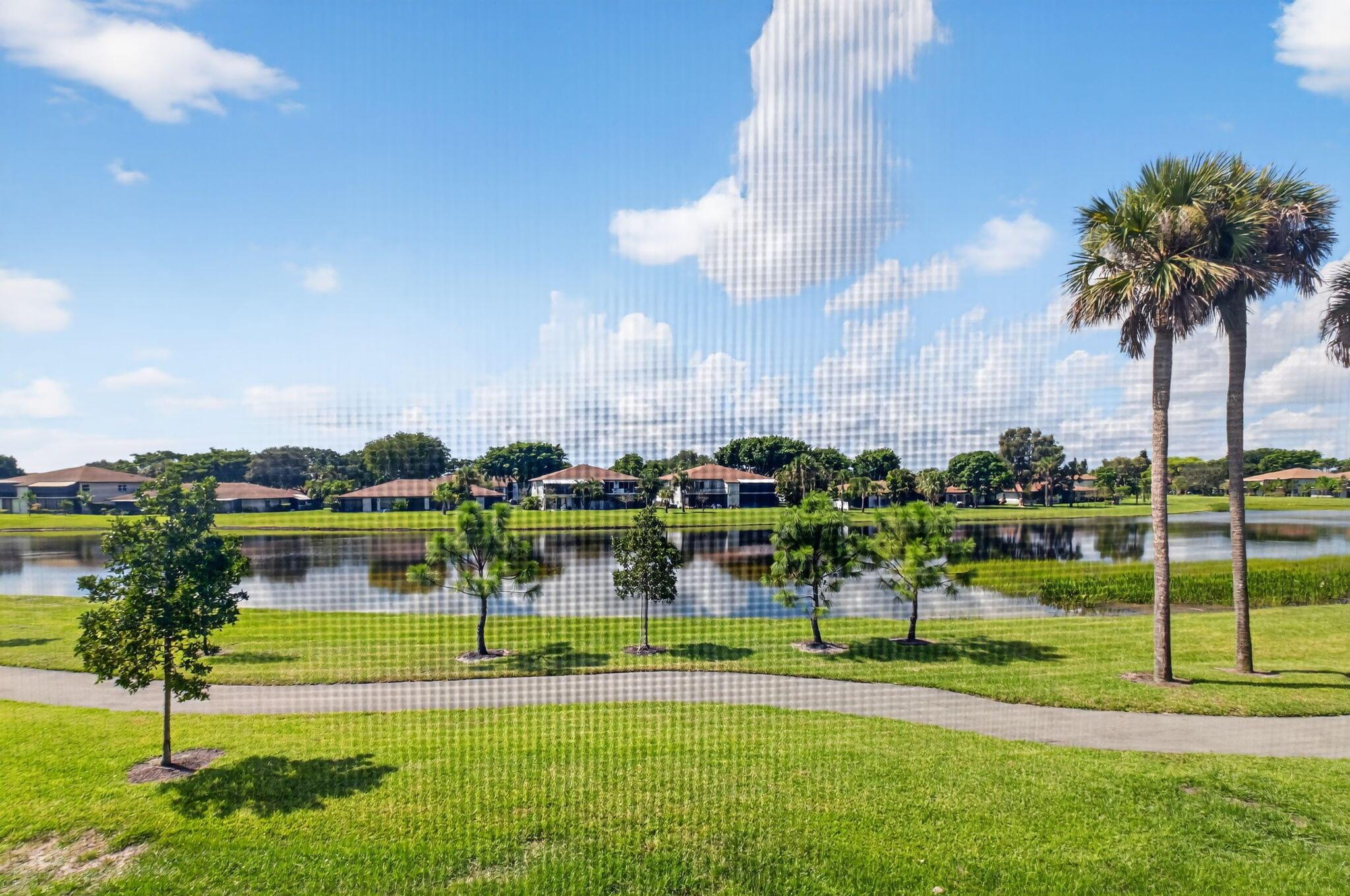 FABULOUS VIEW ... RENOVATED ... IMPACT WINDWS & DOORS ... SPLIT BEDROOMS ... MASTER w/ 9' VANITY & HUGE WALK-IN CLOSET (10.9' x 6.5') ... 2nd BEDROOM PERFECT for DEN or OFFICE ... SCREENED-IN BALCONY (23'X7') w/ STORAGE CLOSET ... COMING SOON ~ 25,000SQ.FT. CLUBHOUSE w/ CLUB POOL + LAP POOL +++ ... PG's CURRENT CLUBHOUSE features LARGE POOL AREA, WHIRLPOOL 9 HAR-TRU TENNIS COURTS with VERY ACTIVE TENNIS PROGRAM ... SHUFFLEBOARD, BOCCI, 2 GYMS, EVENT ROOM, BILLIARDS, CARD ROOMS and a CAFE ... JUST 20 MIN to DELRAY'S FAMED BEACH AREA ... 25 MIN to PALM BEACH INTERN'L AIRPORT ... 35 MIN TO FORT LAUDERDALE'S INTERN'L AIRPORT ... 20 MIN to BOCA RATON'S POPULAR 'BOCA TOWN CENTER' ... 25 MIN to BOCA'S MIZNER PLACE with it's SHOPS, MUSEUM, RESTAURANTS, ETC. ... COME JOIN US !