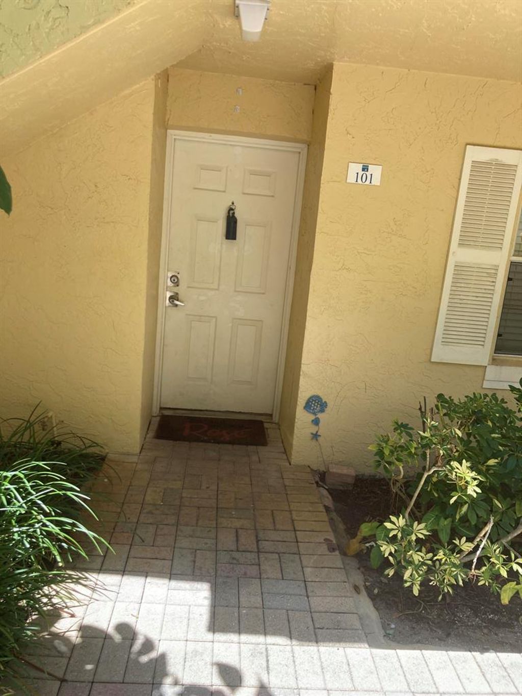 Photo of 1110 Lake Shore Drive #101, Lake Park, FL 33403 (MLS # R10814136)