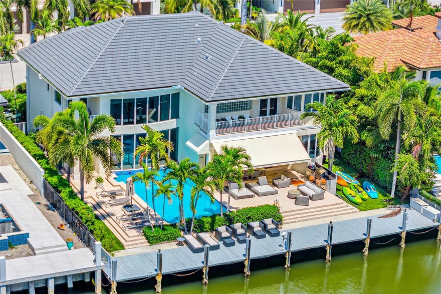 Luxury and income potential converge at this 7BD/6BA Mediterranean estate in exclusive the Nurmi Isles. Set on an 85-ft deepwater lot with no fixed bridges and direct ocean access, this 5,500+ sq ft home offers soaring ceilings, floor-to-ceiling windows, a chef’s kitchen with gas cooking, and seamless indoor-outdoor flow. The flexible layout includes a downstairs bedroom + office, upstairs primary suite with balcony, spa bath, and gym, plus a private guest wing. Outdoors: a heated infinity pool, spa, covered lounge, fire pit, and fully equipped dock. Operated as “Fiesta Key” by Latitude Key, it's a top-performing, fully furnished luxury short-term rental. Minutes to Las Olas, beaches, dining, and shopping. Ideal as a residence or high-yield investment.