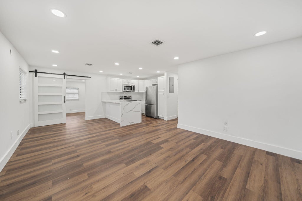 Photo of 5295 HELENE Place, West Palm Beach, FL 33407 (MLS # B26085582)