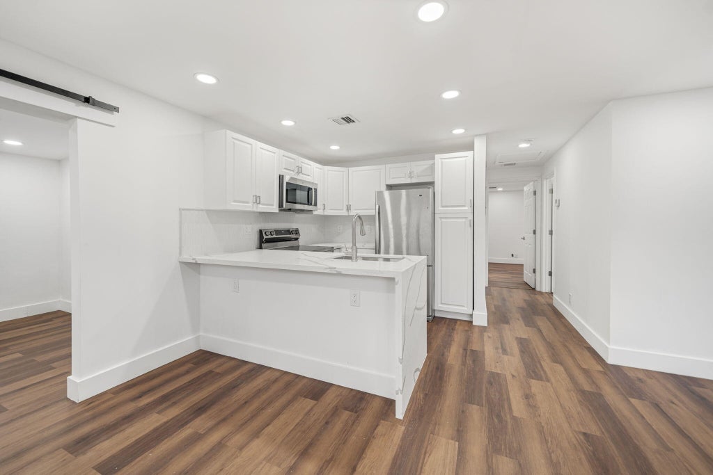 Photo of 5295 HELENE Place, West Palm Beach, FL 33407 (MLS # B26085582)