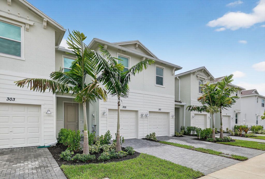 Photo of 305 SE Crossoak Lane, Port Saint Lucie, FL 34984 (MLS # R11123587)