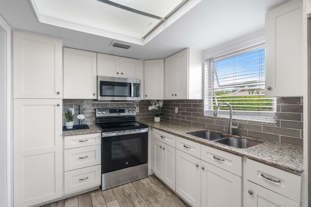 Photo of 410 NE 17th Avenue #101, Boynton Beach, FL 33435 (MLS # B26004224)