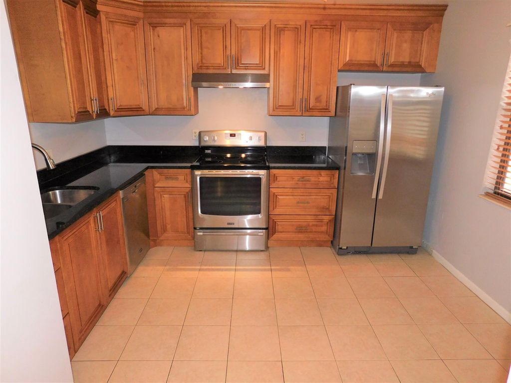 Photo of 2402 Lakeview Circle, Royal Palm Beach, FL 33411 (MLS # R10806040)