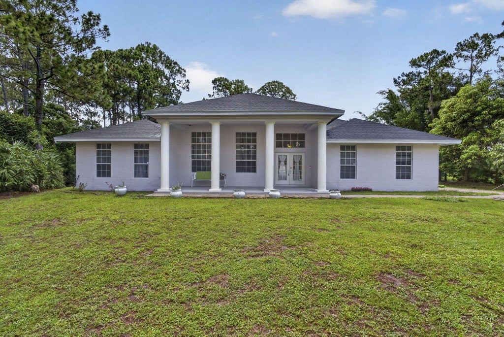 Photo of 16571 78th Road N, The Acreage, FL 33470 (MLS # B26045829)