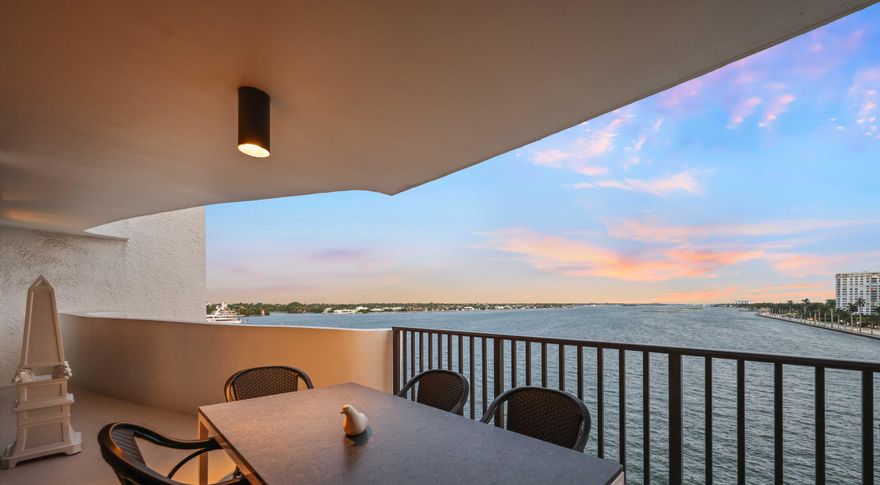 Beautifully renovated waterfront residence with unobstructed southern views over the Intracoastal. The expansive double living area was opened to maximize scale and fully capture the water views, creating a striking main living space.  Custom millwork defines the interiors, including concealed trompe-l'œil doors and integrated vents for a seamless, refined finish. Rich wood flooring adds warmth and depth throughout the main living areas.  The kitchen is fully renovated with custom cabinetry and a clean, functional layout.  The primary suite features custom built-ins, a walk-in closet, and a well-appointed ensuite bathroom. The second bathroom offers a flexible layout with a formal powder room that connects to a separate bathing area with a tub positioned behind an additional door. This residence has impact windows and doors throughout. Additionally, there is a separate closet dedicated to the in-unit washer and dryer. The original footprint can be easily restored, with existing access already in place to convert back to a true two-bedroom, two-bath layout.