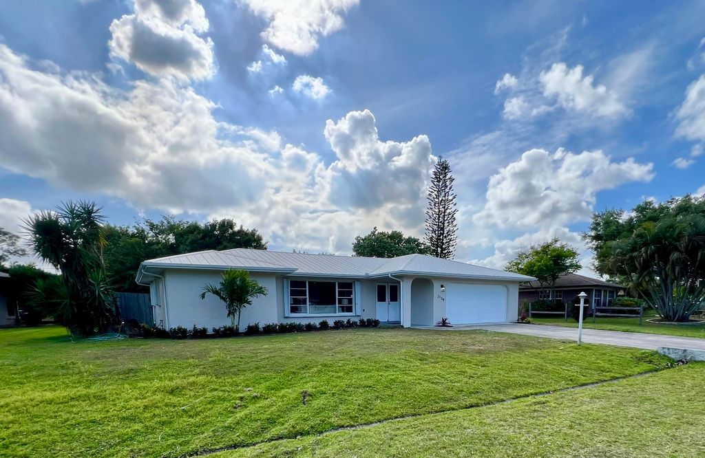 Photo of 2138 SE Dolphin Road, Port Saint Lucie, FL 34952 (MLS # R10972376)