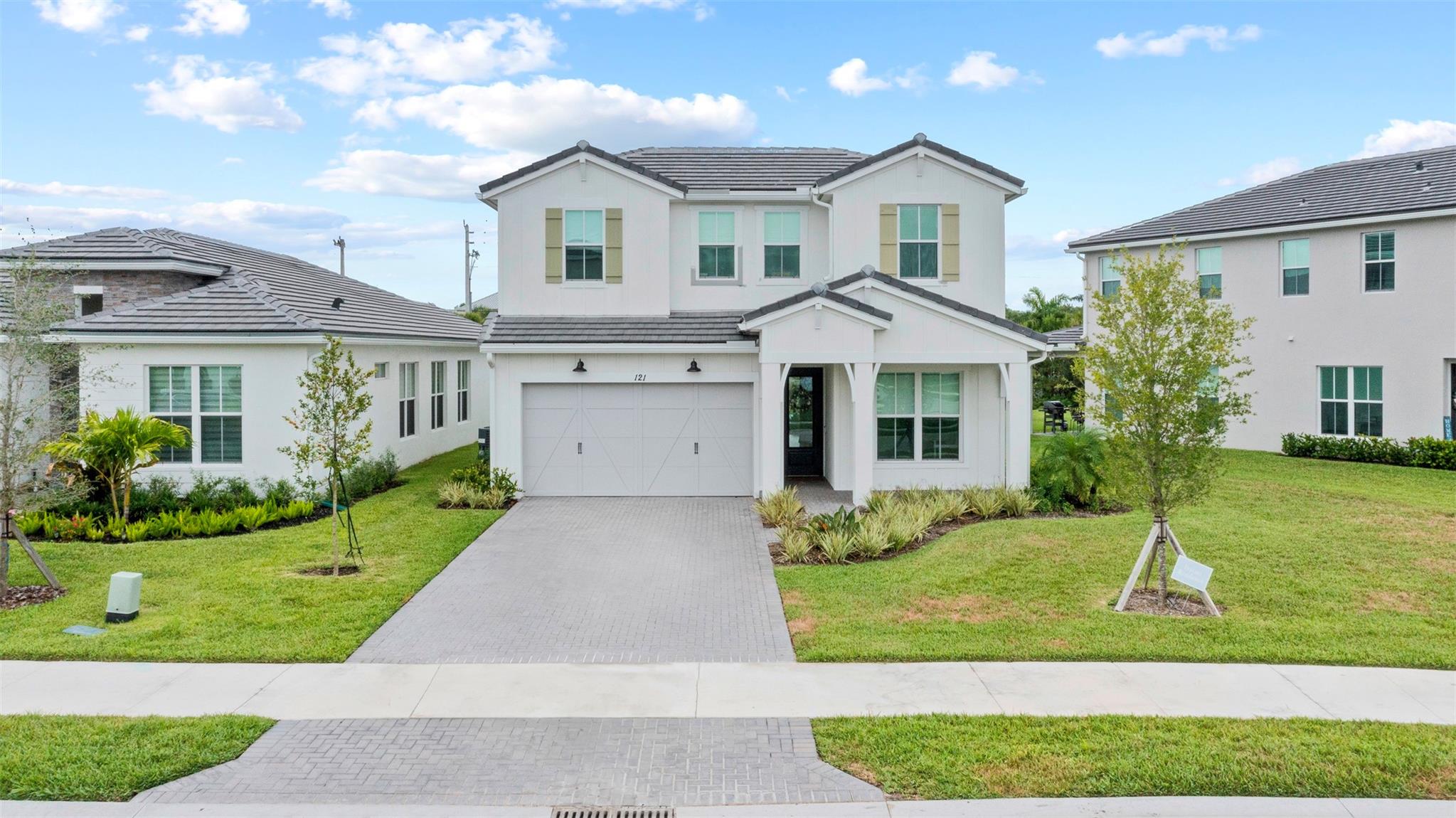 This like-new coastal farmhouse style home is loaded with upgrades - real wood beams, shiplap accents, rattan lighting, woven blinds, full house water filtration with RO system, and custom built-in with electric fireplace. The main level offers a serene primary suite plus an office that can serve as a 4th bedroom. Upstairs, two bedrooms share a spacious loft/landing - ideal for a playroom or flex space. The peaceful backyard is newly landscaped with trees for added privacy. Built of solid concrete with warranties still in place for all major systems and structure, this home offers lasting peace of mind. Salerno Reserve features resort-style amenities including a pool, pickleball courts, and kids’ play area. Perfectly located just 10 minutes to I-95 and downtown Stuart’s waterfront charm!