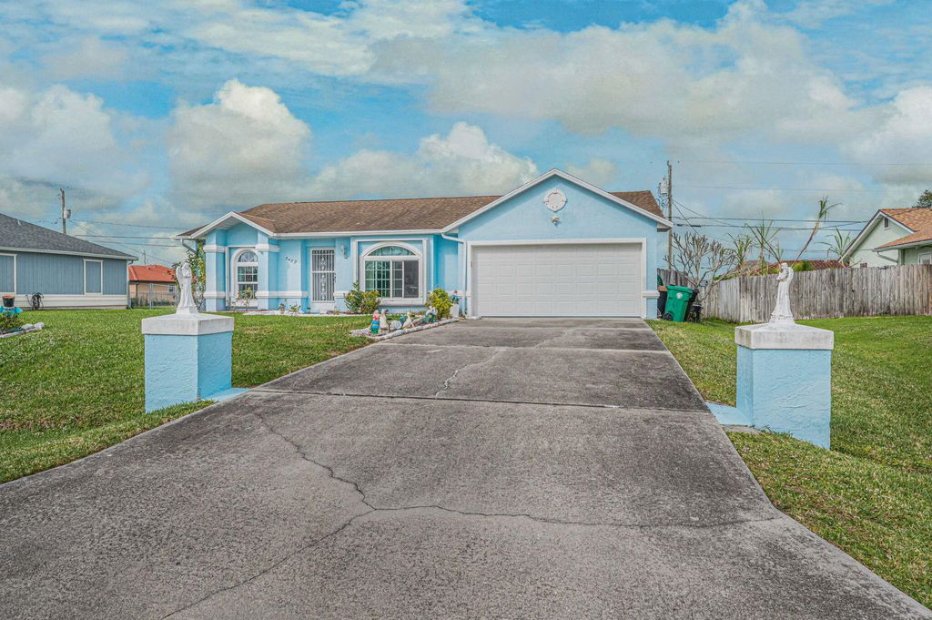 Photo of 5489 NW Evanston Avenue, Port Saint Lucie, FL 34983 (MLS # R10951893)