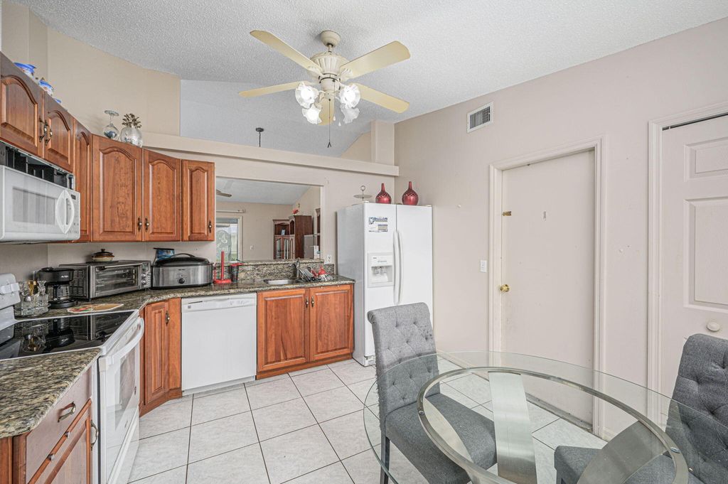 Photo of 5489 NW Evanston Avenue, Port Saint Lucie, FL 34983 (MLS # R10951893)