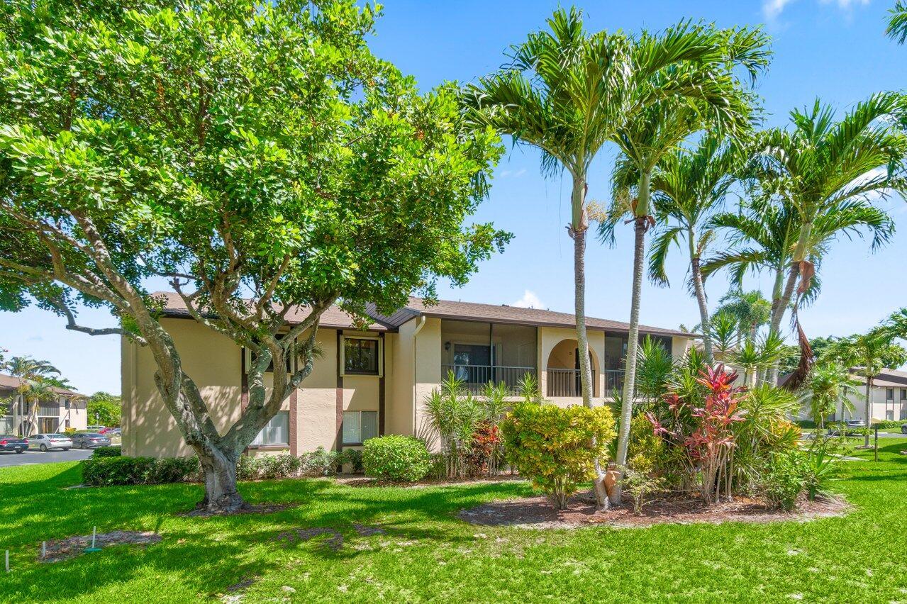 Step into this charming two-bedroom two full bath home surrounded by garden views. Walking into the home you will notice the welcoming natural light and extensive living room space. Features to take in recessed lighting, laundry closet, newer oven all immaculately maintained. Kitchen features wrap around cabinetry and an island great for hosting steps away from the dining room. Both bedrooms have walk in closets and primary bedroom has an on-suite bathroom with a stand-up shower. Guest bathroom has a bathtub shower combo. Peace of mind with impact windows and accordion shutters on all the windows. You do not want to miss out on your chance to rent this slice of paradise.