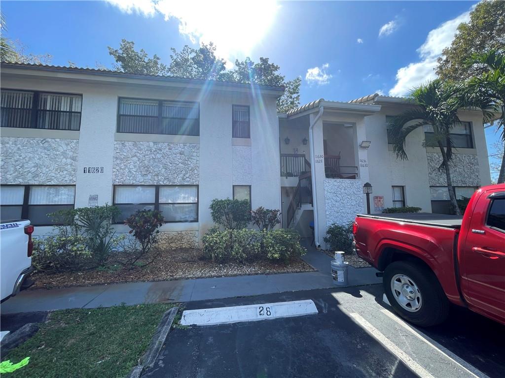 ***AVAILABLE FOR IMMEDIATE MOVE IN***WELCOME HOME TO THIS FIRST FLOOR CORNER UNIT IN THE HEART OF CORAL SPRINGS. THIS UNIT FEATURES NEUTRAL TILE FLOOR THROUGHOUT, UPDATED KITCHEN, SPACIOUS LIVING ROOM, TONS OF WINDOWS FOR NATURAL LIGHT, WASHER & DRYER IN UNIT, UNIT COMES WITH 1 PARKING SPACE & THE ABILITY TO RENT ANOTHER, PETS OK WITH LANDLORD APPROVAL ($40/M PER PET), NO AGGRESSIVE BREEDS