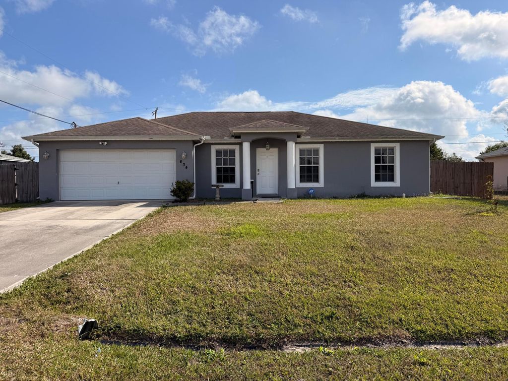 Photo of 634 SW Millard Drive, Port Saint Lucie, FL 34953 (MLS # R11160894)