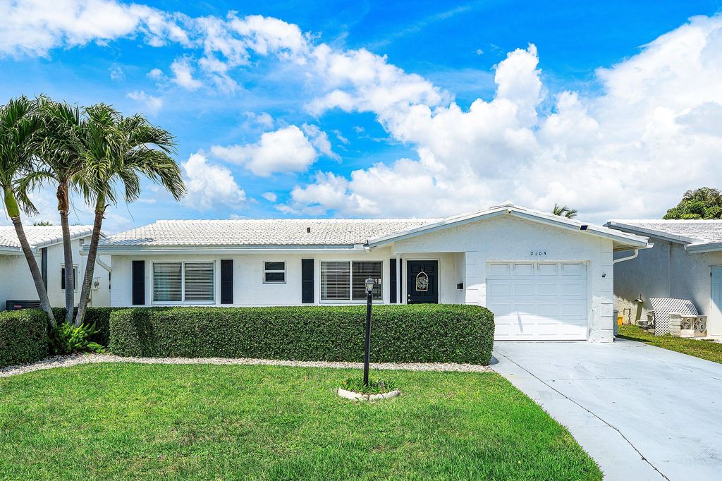 Photo of 2105 SW 14th Place, Boynton Beach, FL 33426 (MLS # B26028098)