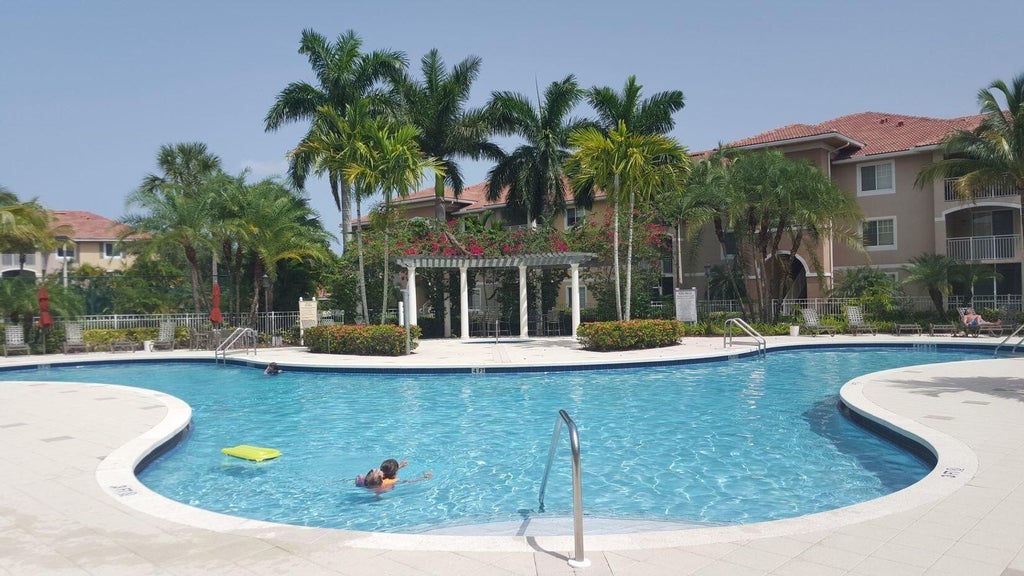 Photo of 6482 Emerald Dunes Drive #301, West Palm Beach, FL 33411 (MLS # R10938614)