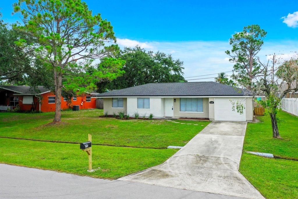 Photo of 2195 SE Shelter Drive, Port Saint Lucie, FL 34952 (MLS # R11000691)