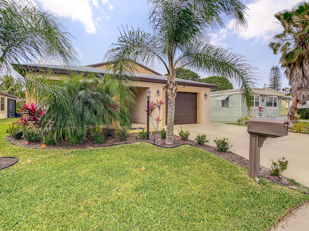 Photo of 19 El Camino Real, Port Saint Lucie, FL 34952 (MLS # R10789531)