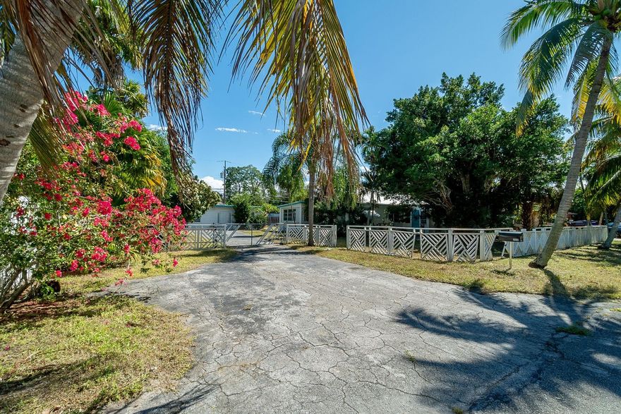 Amazing opportunity to own a potentially multi-use property just blocks off Atlantic Ave!  This property is located in the Old School Square Historic District and sits on over a quarter acre lot.  There is a 3 bedroom/1 bathroom, 1771sf home with hardwood floors and a Florida Room, and there is also a converted 825sf 1 bedroom/1 bathroom garage.  The possibilities are endless!  Minutes from Downtown Delray, this property will not last long!  Schedule your showing today!