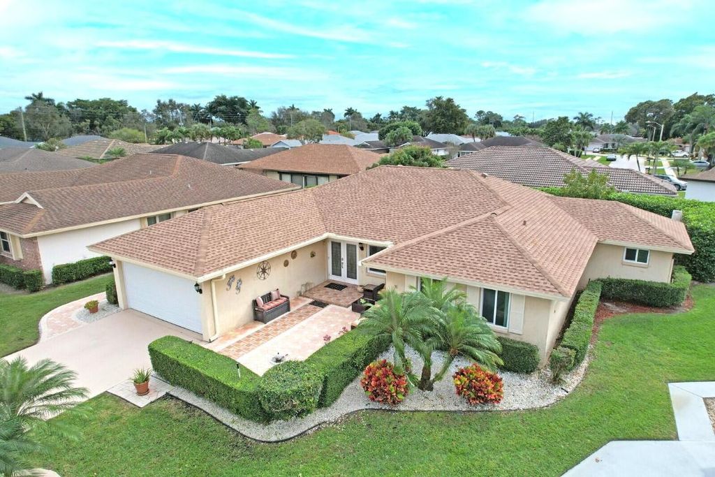 Photo of 10668 S Greentrail Drive S, Boynton Beach, FL 33436 (MLS # R11155134)