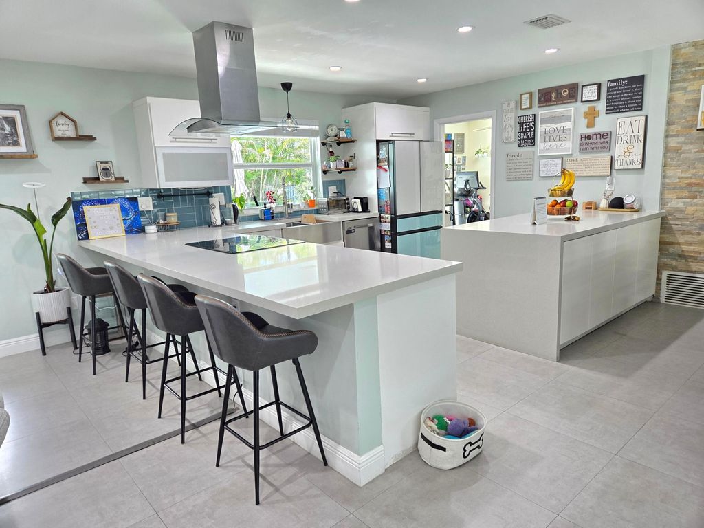 Photo of 8730 NW 17th Court, Pembroke Pines, FL 33024 (MLS # B26012434)