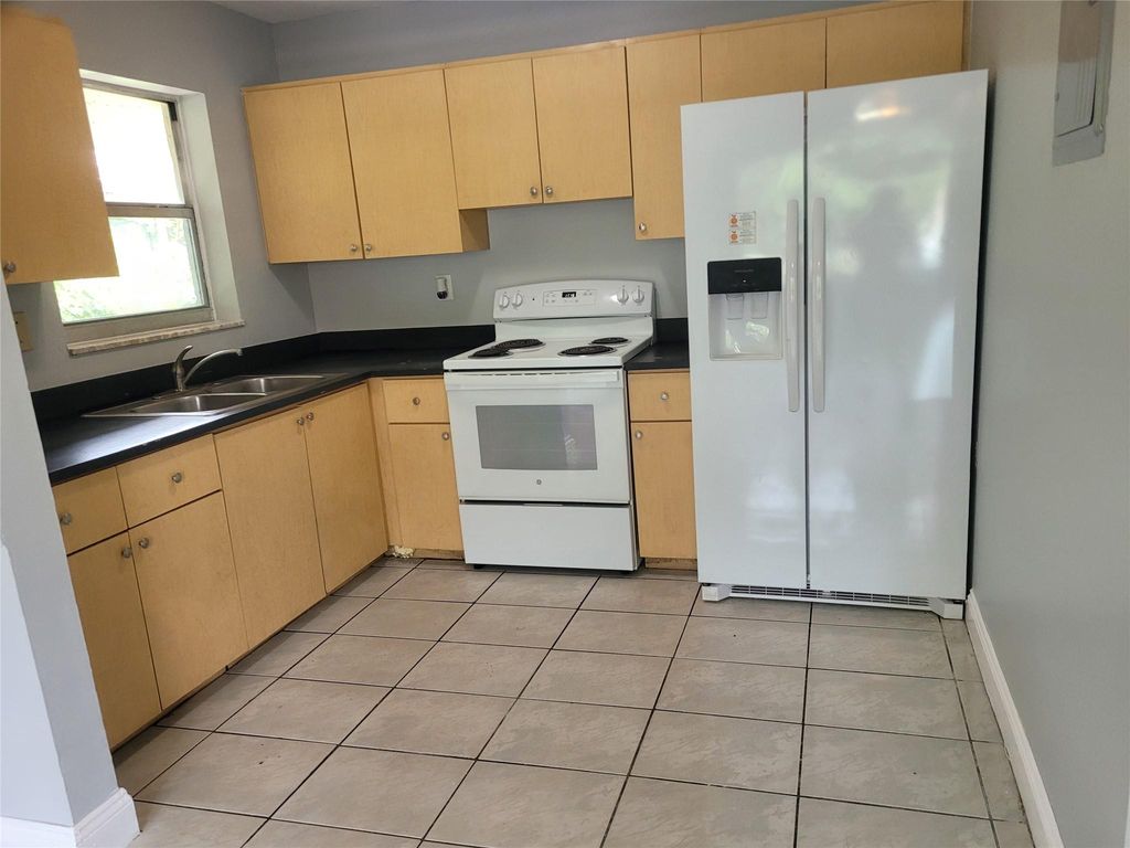 Photo of 4107 Riverside Drive #A, Coral Springs, FL 33065 (MLS # F10517050)