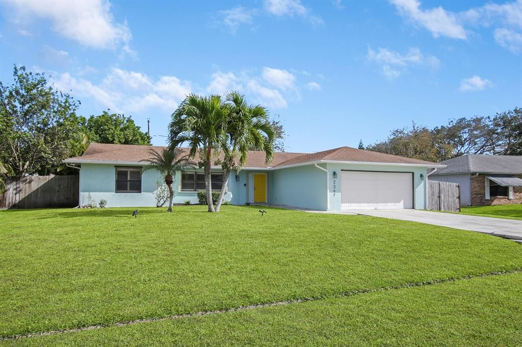 Photo of 2367 SE Holland Street, Port Saint Lucie, FL 34952 (MLS # R10765653)