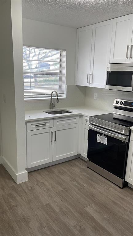 Beautiful 2/1 with a wonderful lake view. Located on first floor. Laminate floors throughout the unit no carpet Updated Kitchen with new appliances. Condo features community pool and laundry room Close to shopping plaza, very close to Walmart and more . Close to turnpike, 441 and Atlantic Blvd As per Association: 3 people max per unit . No minimum credit score required. EASY TO SHOW !