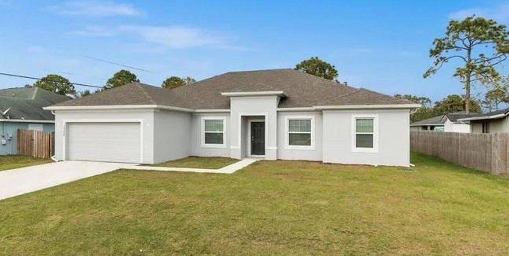 Photo of 1773 SW Commerce Ave, Port Saint Lucie, FL 34953 (MLS # F10375554)