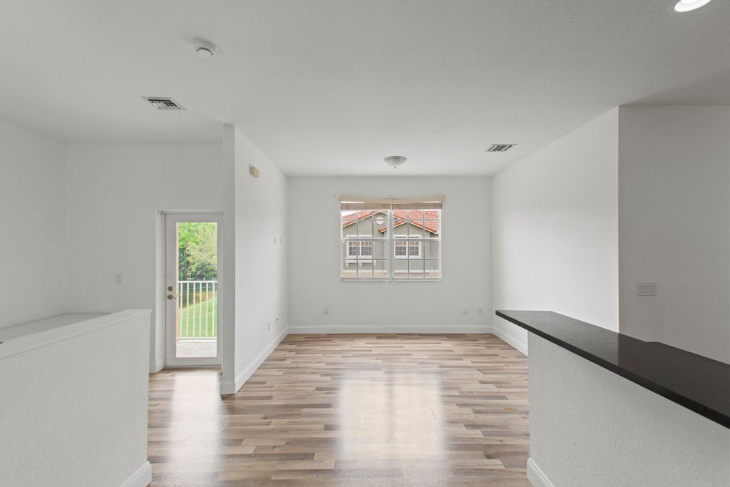 Photo of 9051 Plymouth Place #20203, Tamarac, FL 33321 (MLS # B26004293)