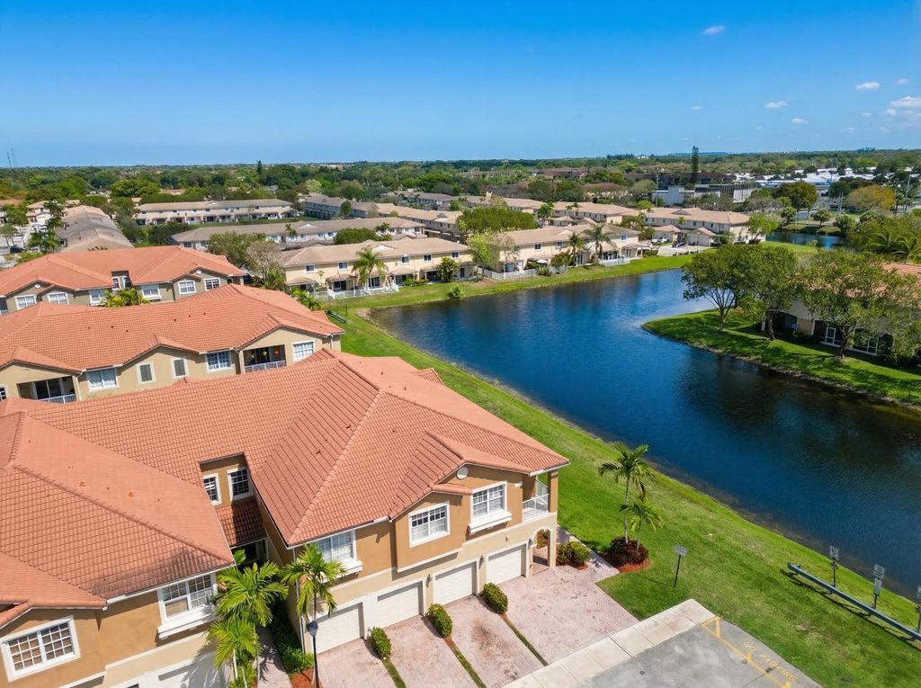 Photo of 9051 Plymouth Place #20203, Tamarac, FL 33321 (MLS # B26004293)