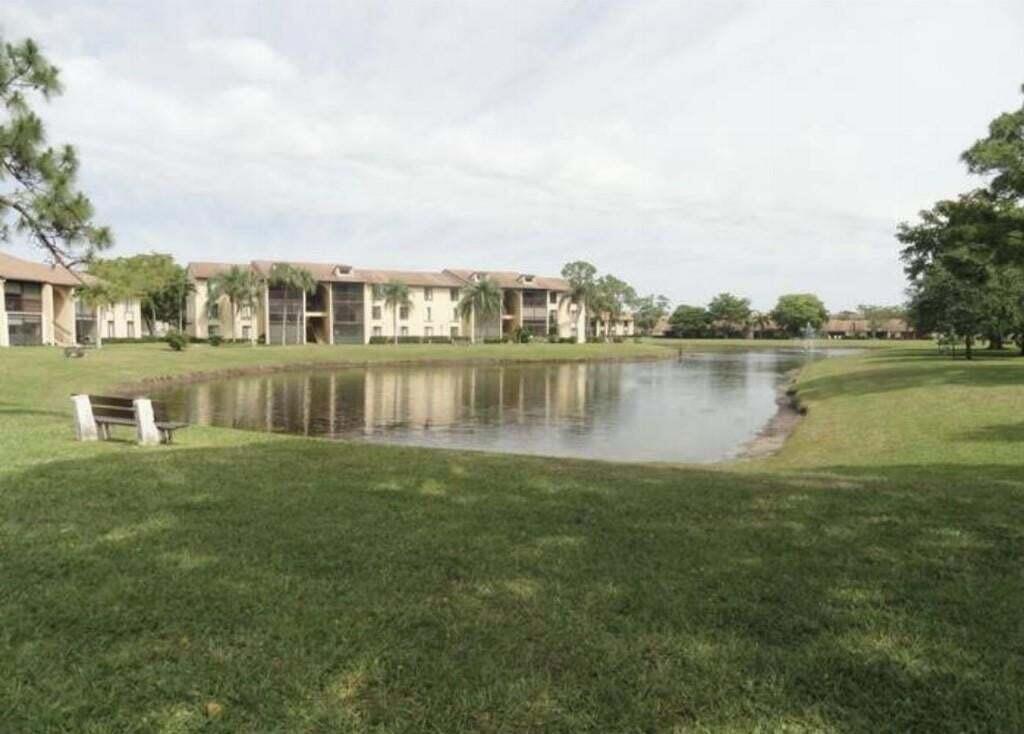 Photo of 814 SKY PINE Way #A1, Greenacres, FL 33415 (MLS # B26093814)