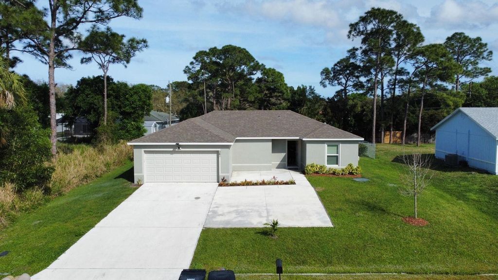 Photo of 361 NW Friar St, Port Saint Lucie, FL 34983 (MLS # R11065534)