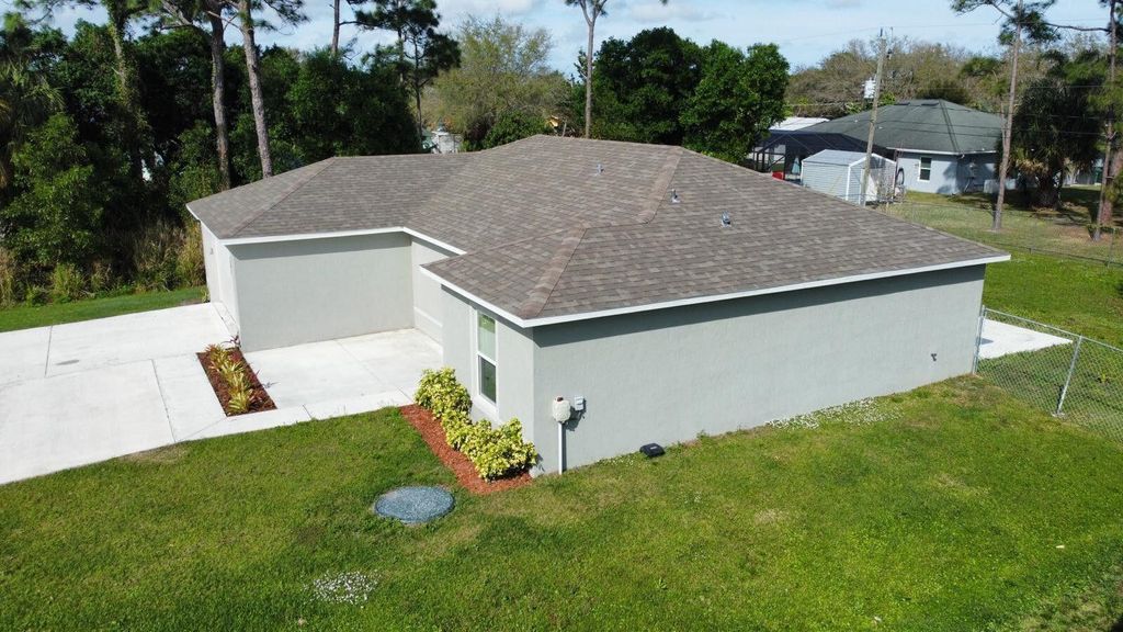Photo of 361 NW Friar St, Port Saint Lucie, FL 34983 (MLS # R11065534)